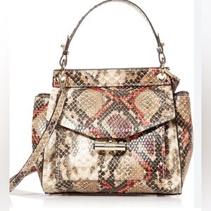 New Fiorelli Flynn Bag in Snakeskin. Comes with removable strap,